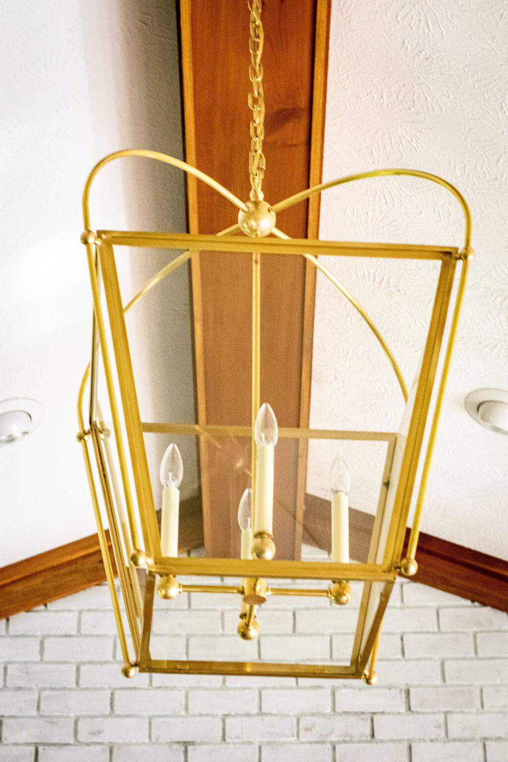 brushed brass lantern replacement for fan in Family Room space Eclectic Interiors brushed brass lantern replacement for fan in Family Room space Lindsey Putzier Design Studio