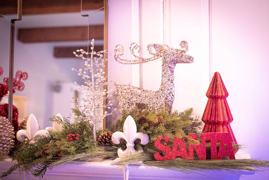 17" tall glittery reindeer on fireplace mantel for Christmas holiday season Lindsey Putzier Design Studio Ohio