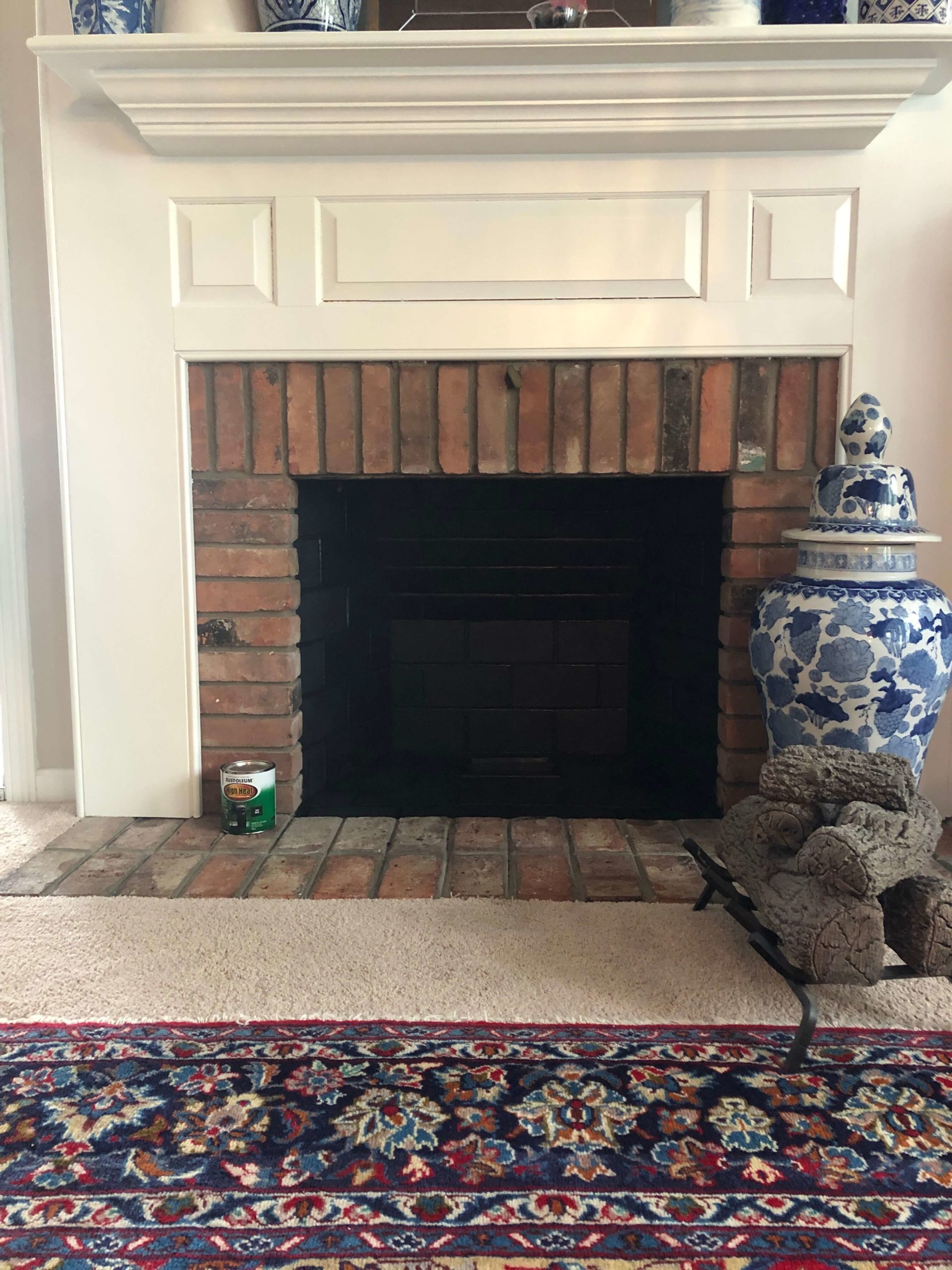 Progress photo - painted fireplace in Family Room space Eclectic Interiors Ohio