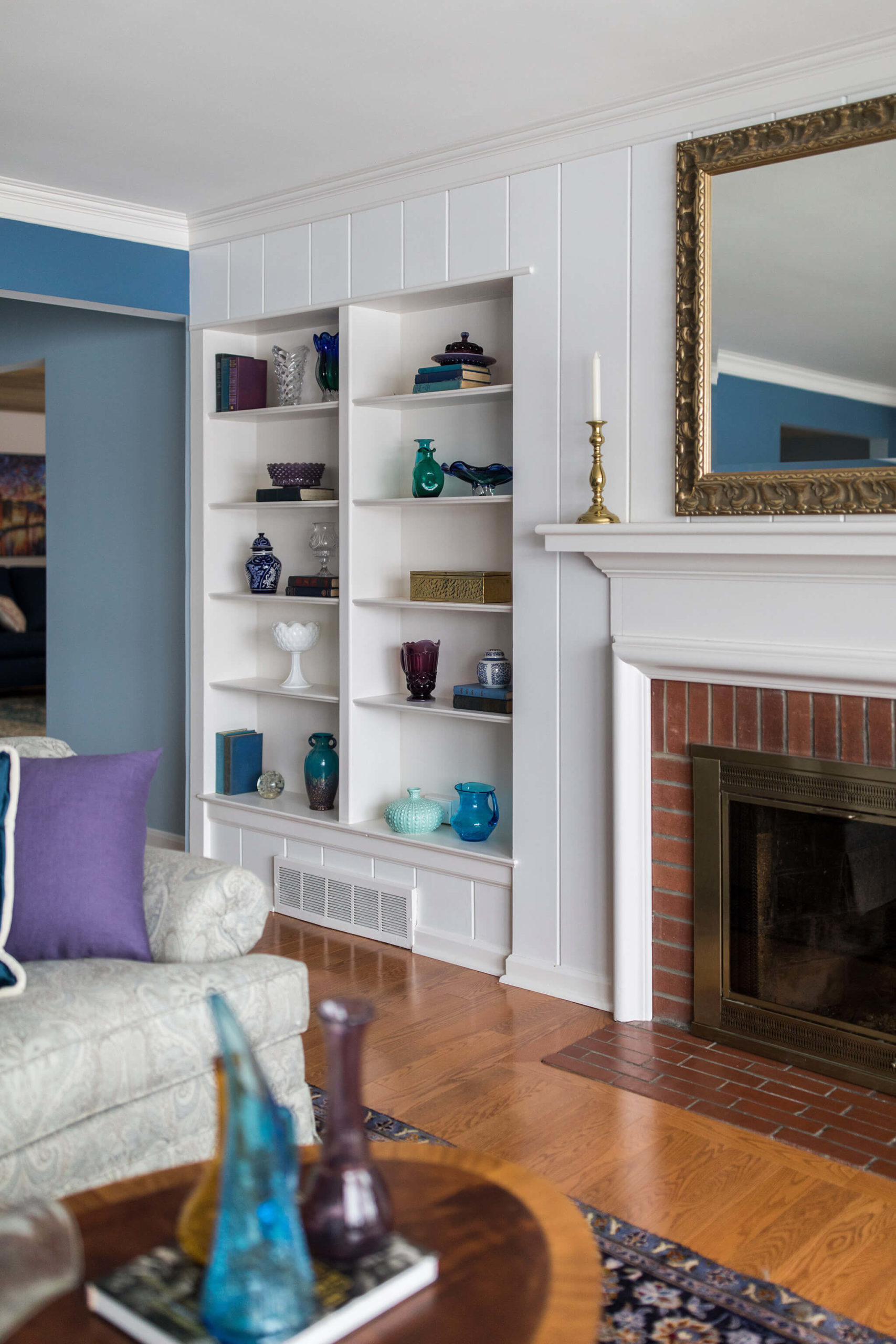 Family Room Built-in Shelves After Eclectic Interiors