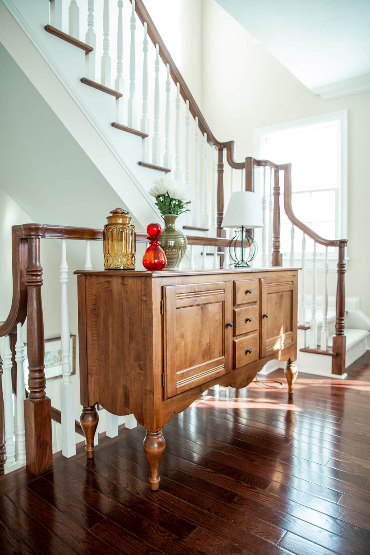 Living Room Buffet in nook by staircase Lindsey Putzier Design Studio Ohio