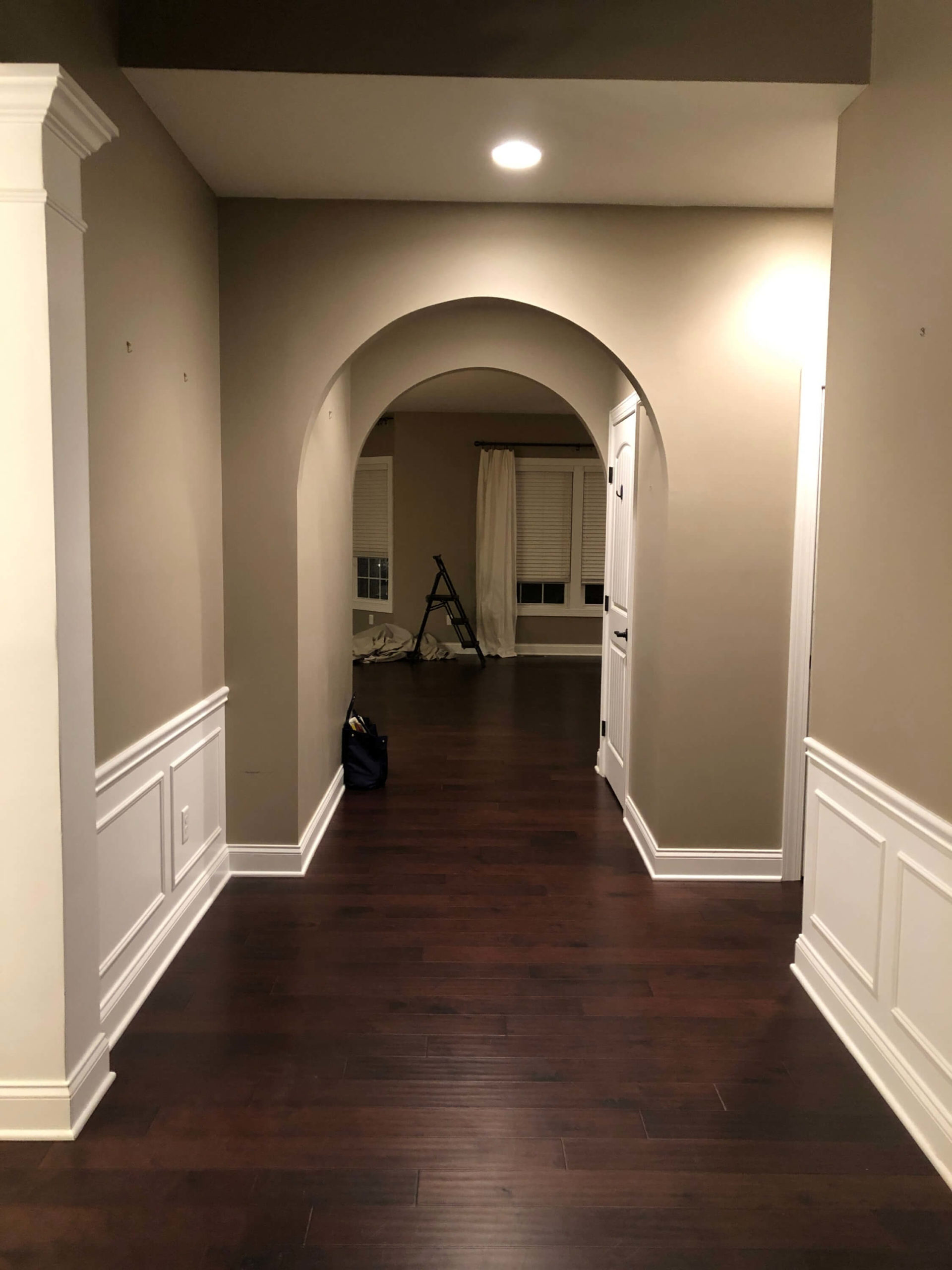 Before photo of arched passageways Lindsey Putzier Design Studio Hudson, OH