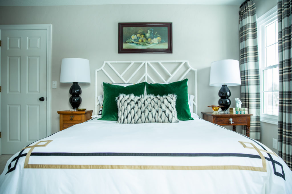 neutral palette bedroom with pops of amber and dark green Lindsey Putzier Design Studio