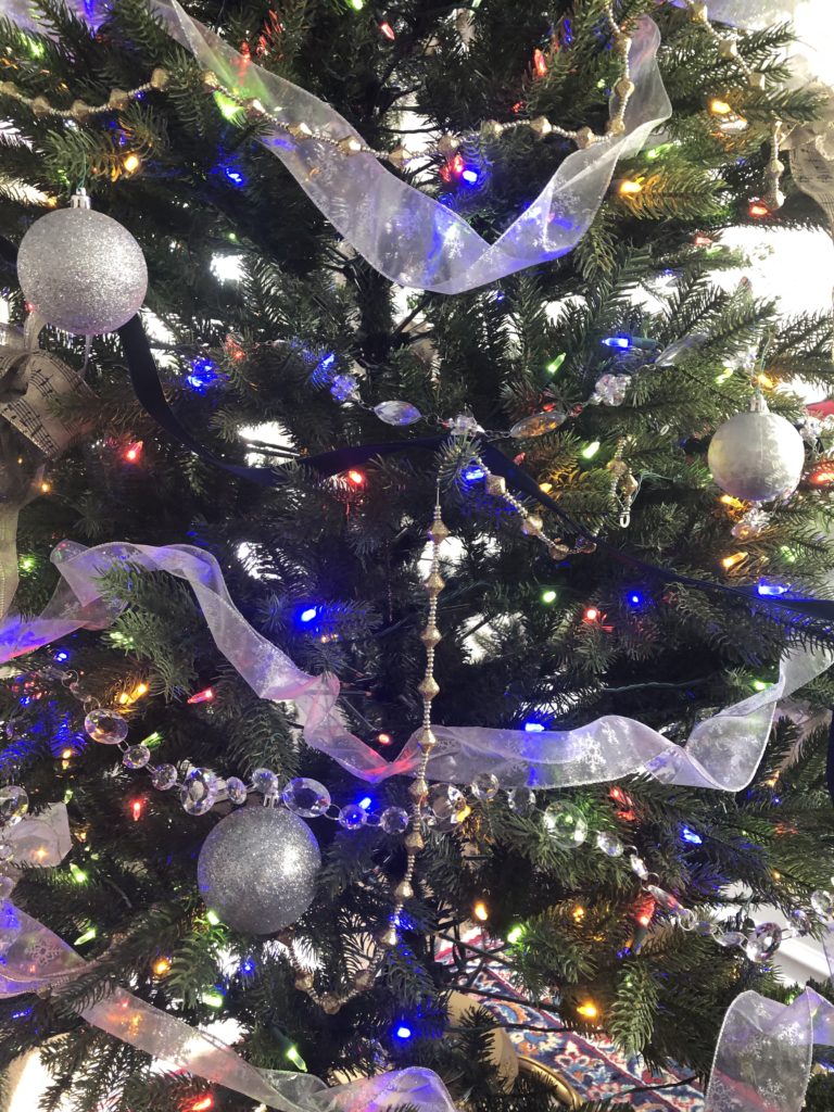 close up of ribbon and garland holiday decorations Lindsey Putzier Design Studio Ohio