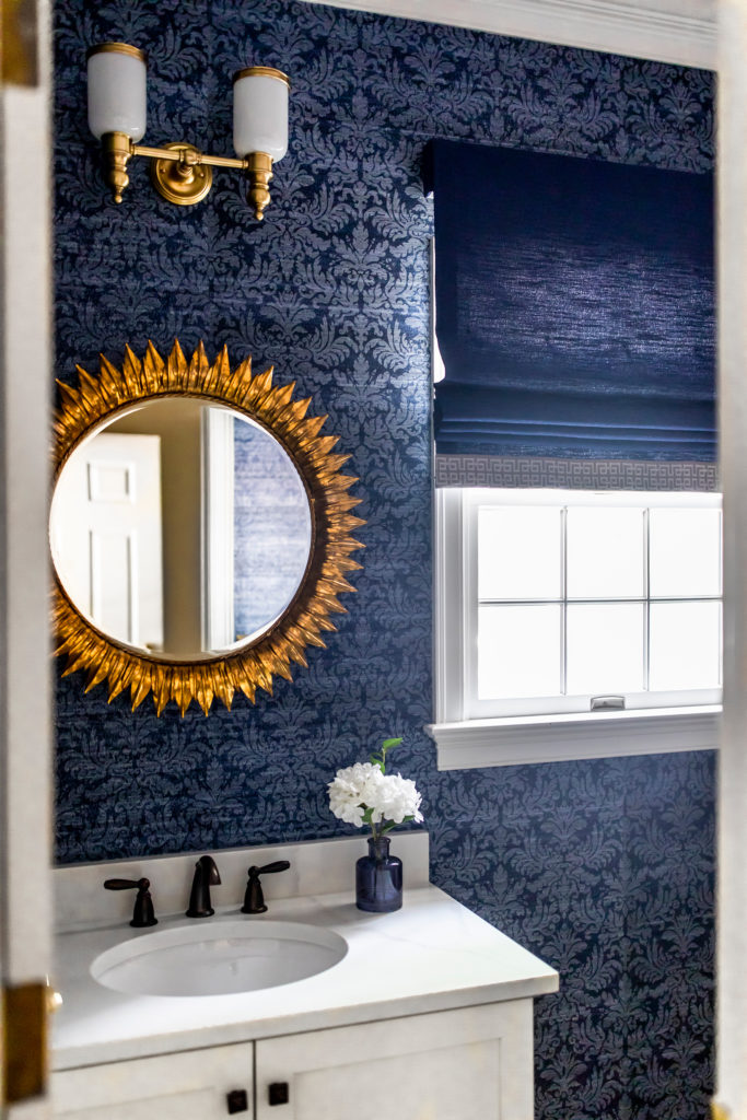 Dark blue custom roman shade to replace drapes in half bath Lindsey Putzier Design Studio