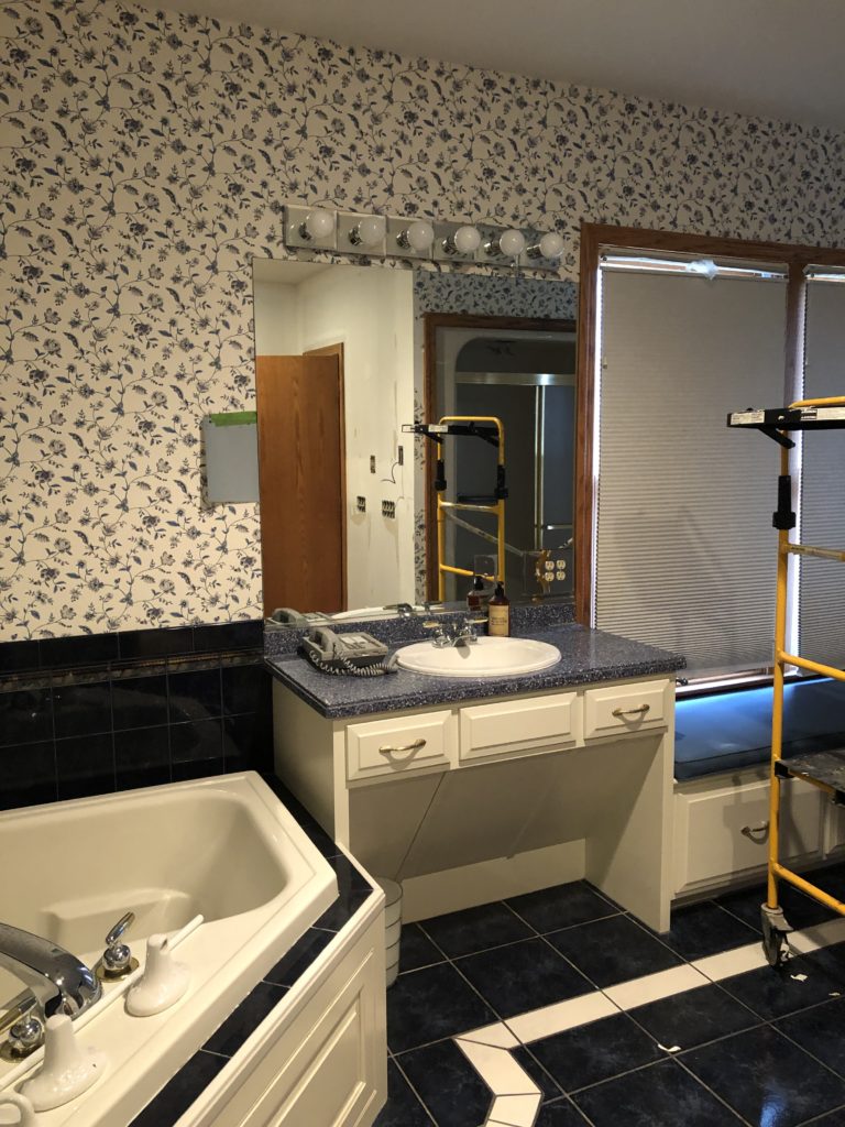 Before Photo of Dark Blue Flooring Tile in Master Bathroom Lindsey Putzier Design Studio