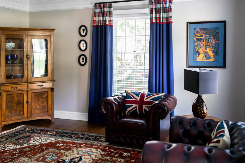 British inspired living room with custom drapery Lindsey Putzier Design Studio