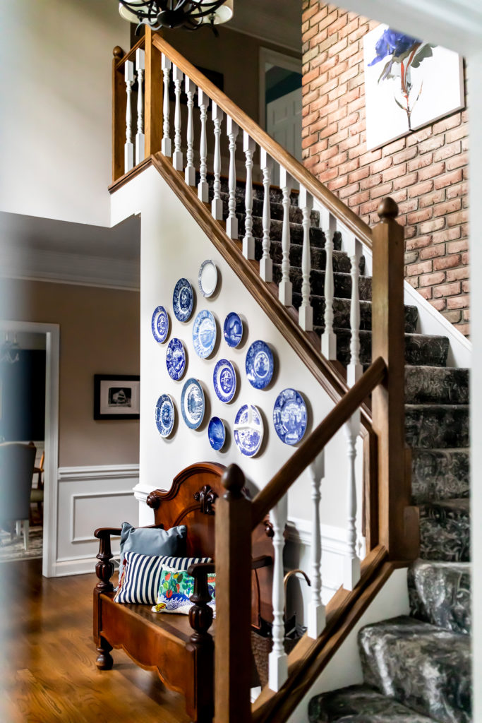 british themed foyer and staircase Ohio Lindsey Putzier Design Studio