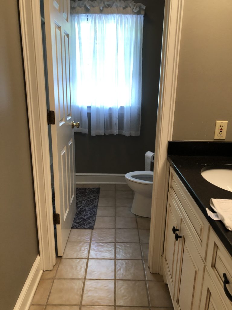 White grout turned use floor in bathroom renovation (before they were our client) Lindsey Putzier Design Studio