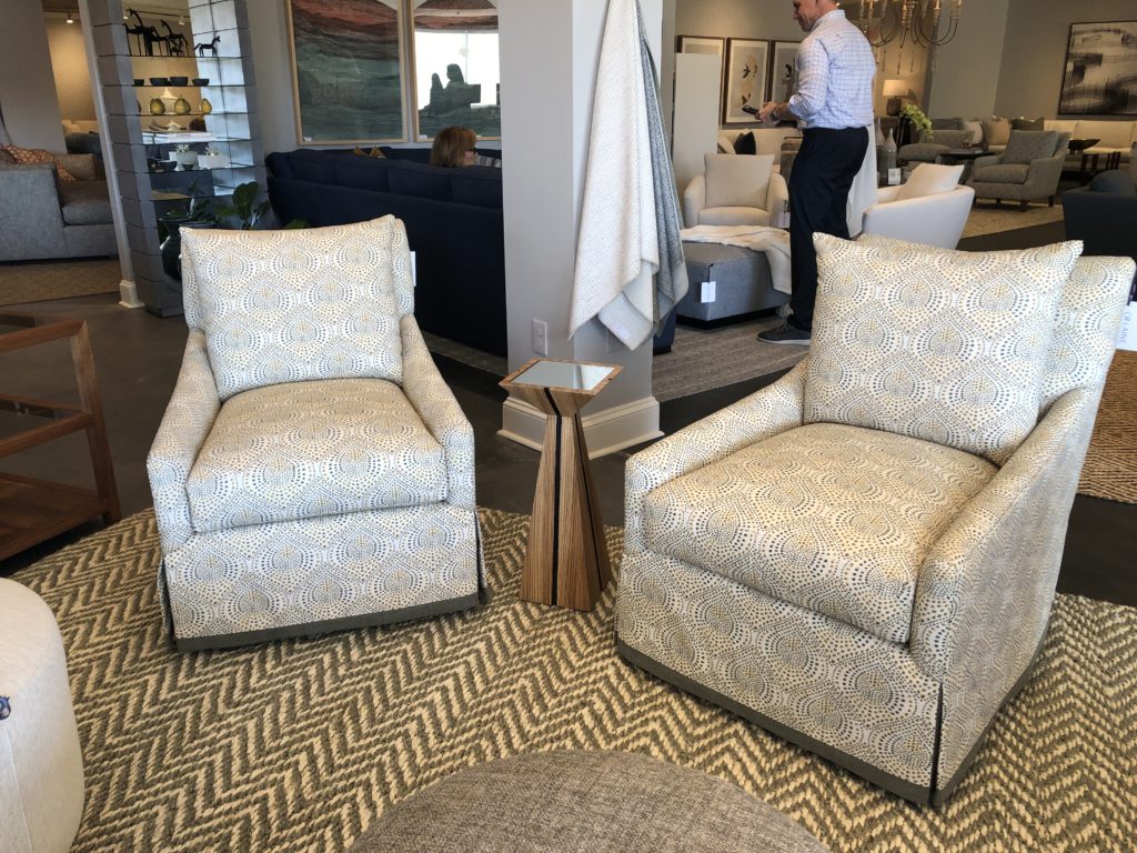 Skirted arm chairs with dotted geometric patterned upholstery Lindsey Putzier Design Studio