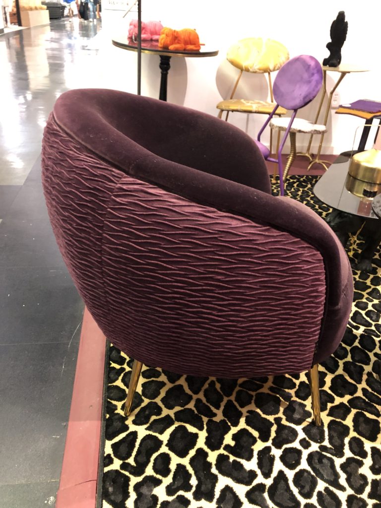 Egg shaped red velvet chair Lindsey Putzier Design Studio