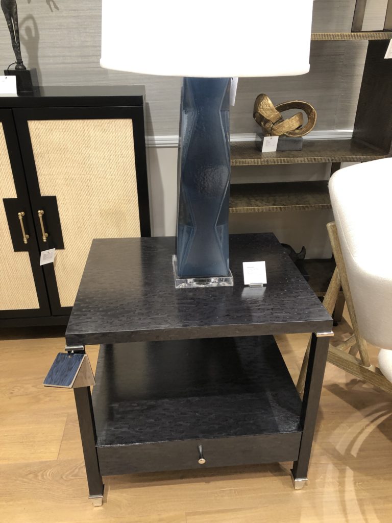 Black statement table with water droplet designs Lindsey Putzier Design Studio