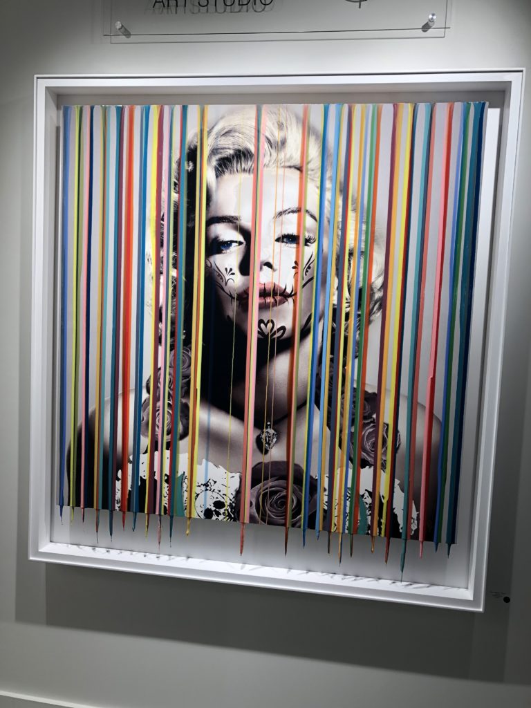 Marilyn Monroe in day of the dead makeup and dress with multicolored stripes vertically across canvas Lindsey Putzier Design Studio