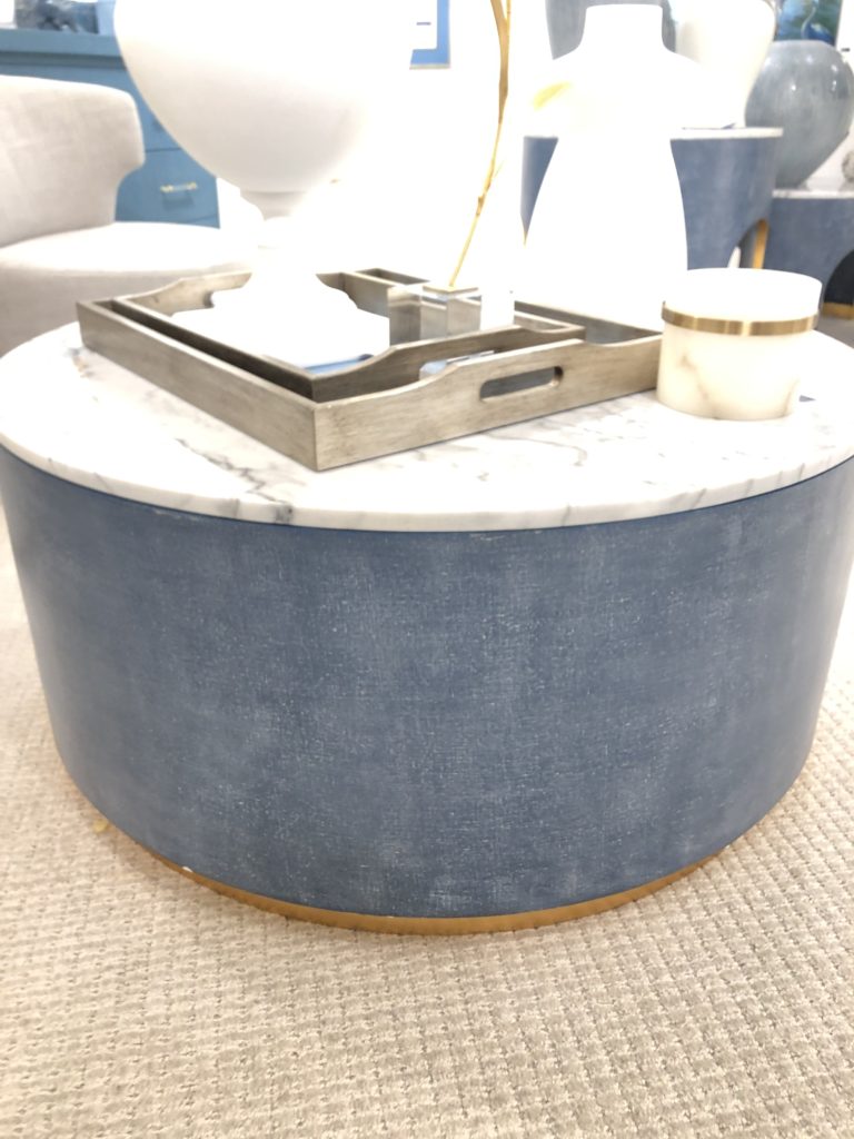 Round statement table with blue base and marble top Lindsey Putzier Design Studio