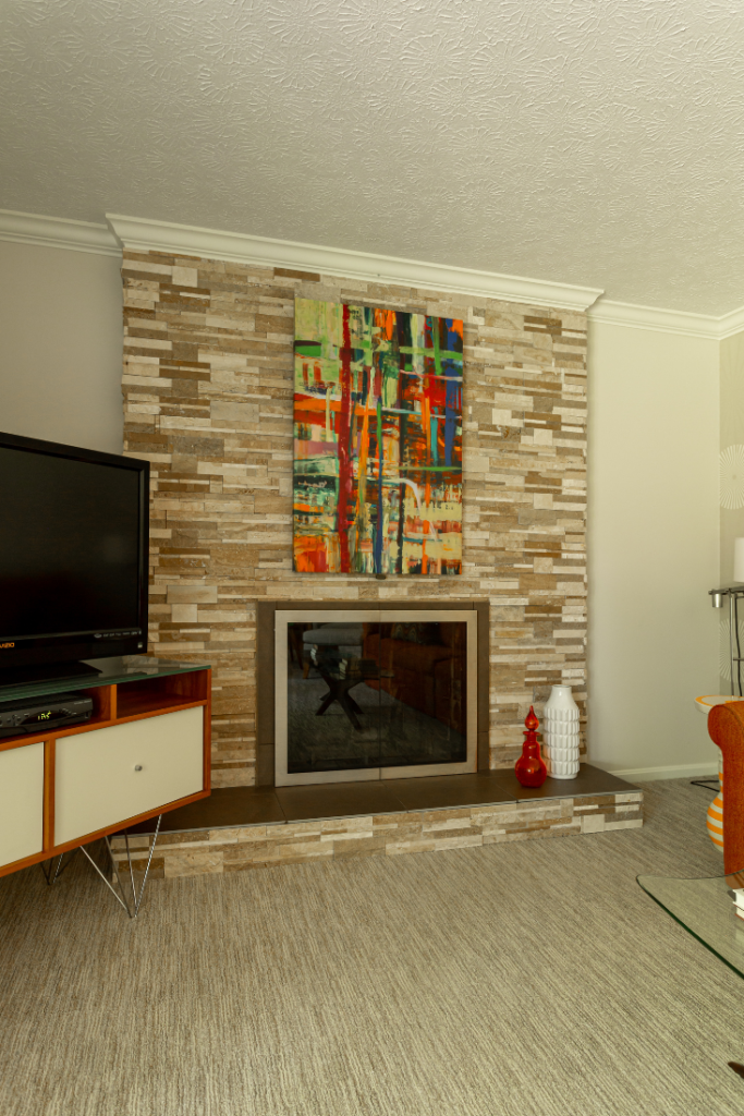 After image of Mid-Century Family Room fire place Lindsey Putzier Design Studio