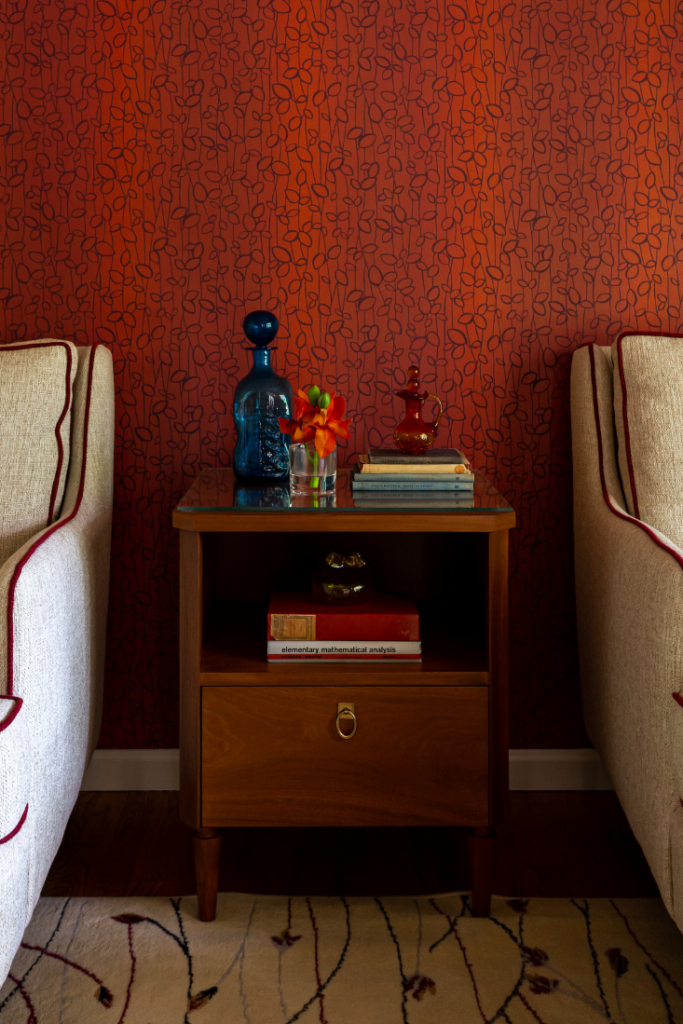 Red with black patterned wallpaper in Ohio Sitting Room