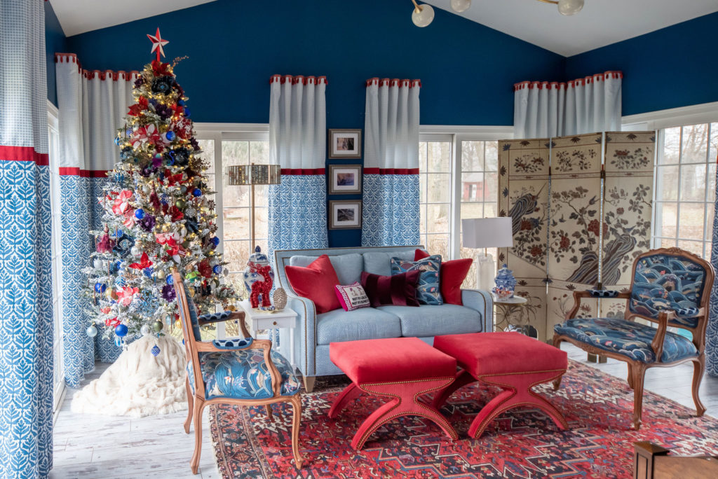 Custom draperies in Christmas decorated family featuring reds and blues