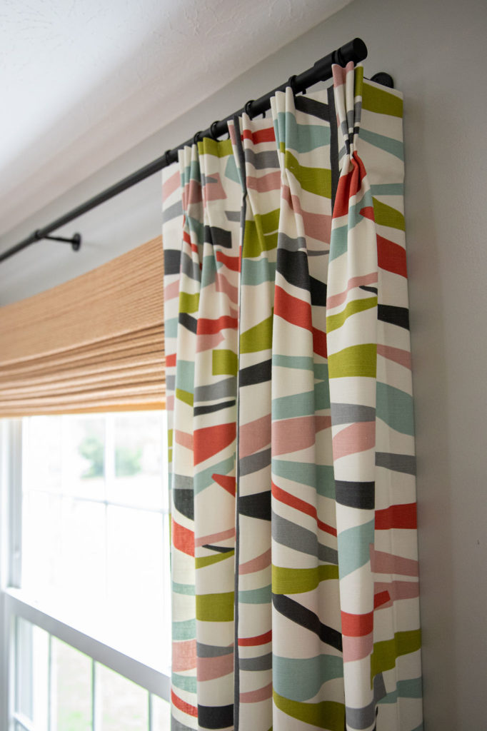 Pleated custom draperies in Mid-Century Boho Dining Room Lindsey Putzier Design Studio