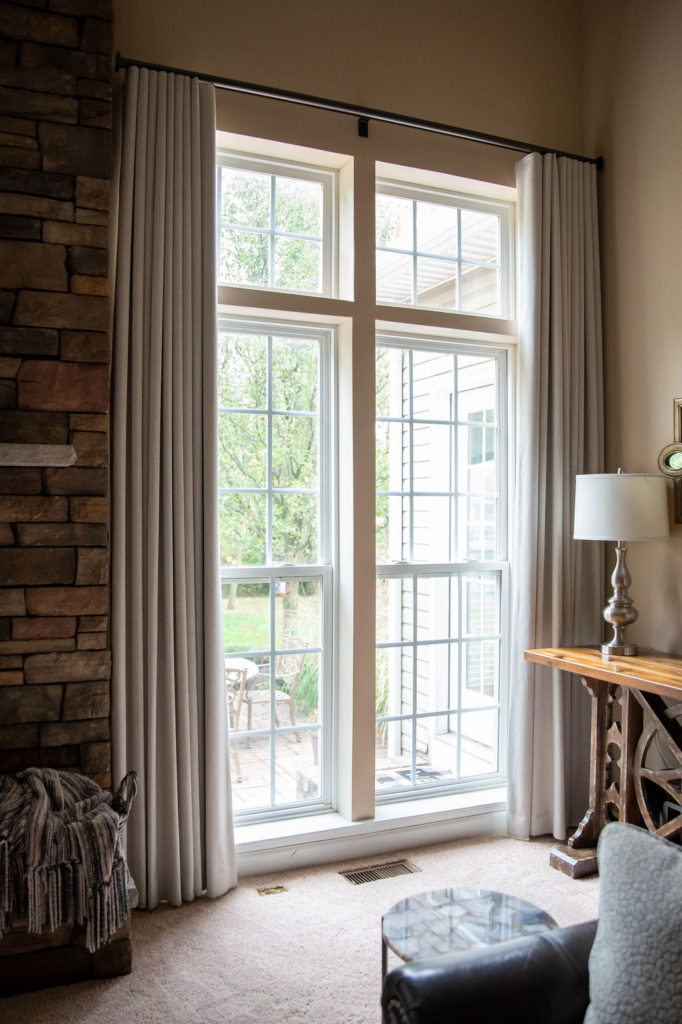 Custom ripplefold draperies in Ohio Family Room Lindsey Putzier Design Studio