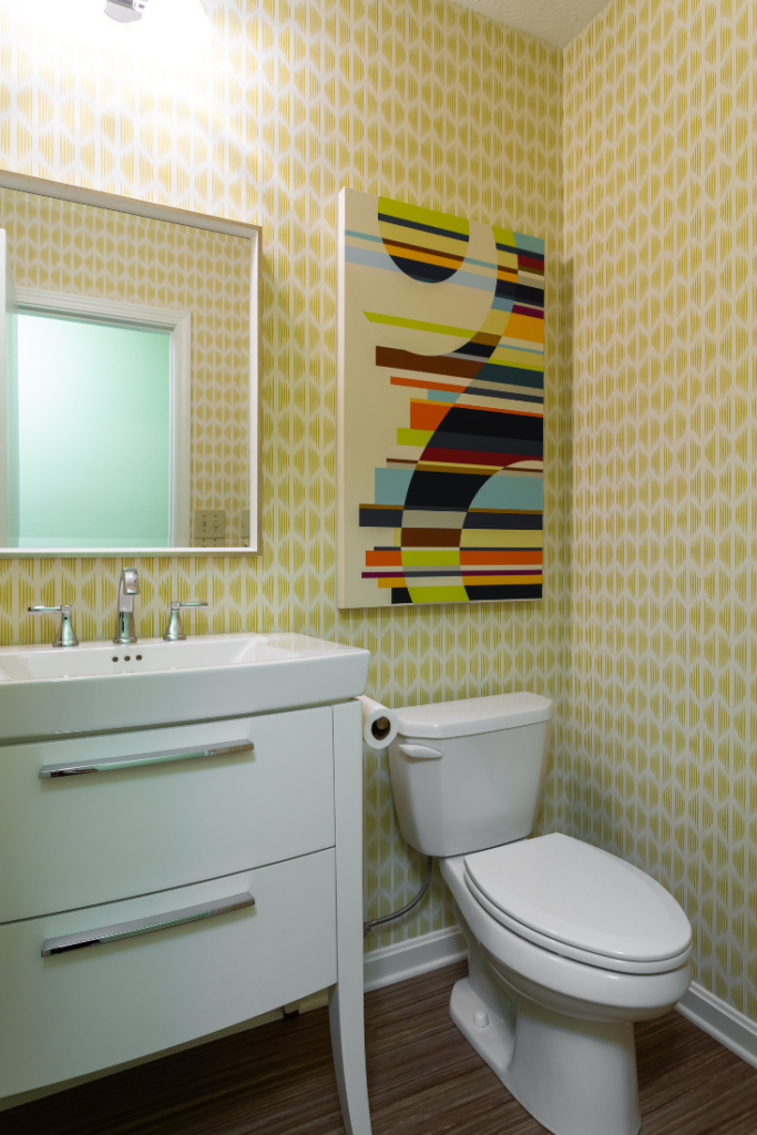 After image of Mid-Century Powder room with Schumacher abstract wallpaper Lindsey Putzier Design Studio
