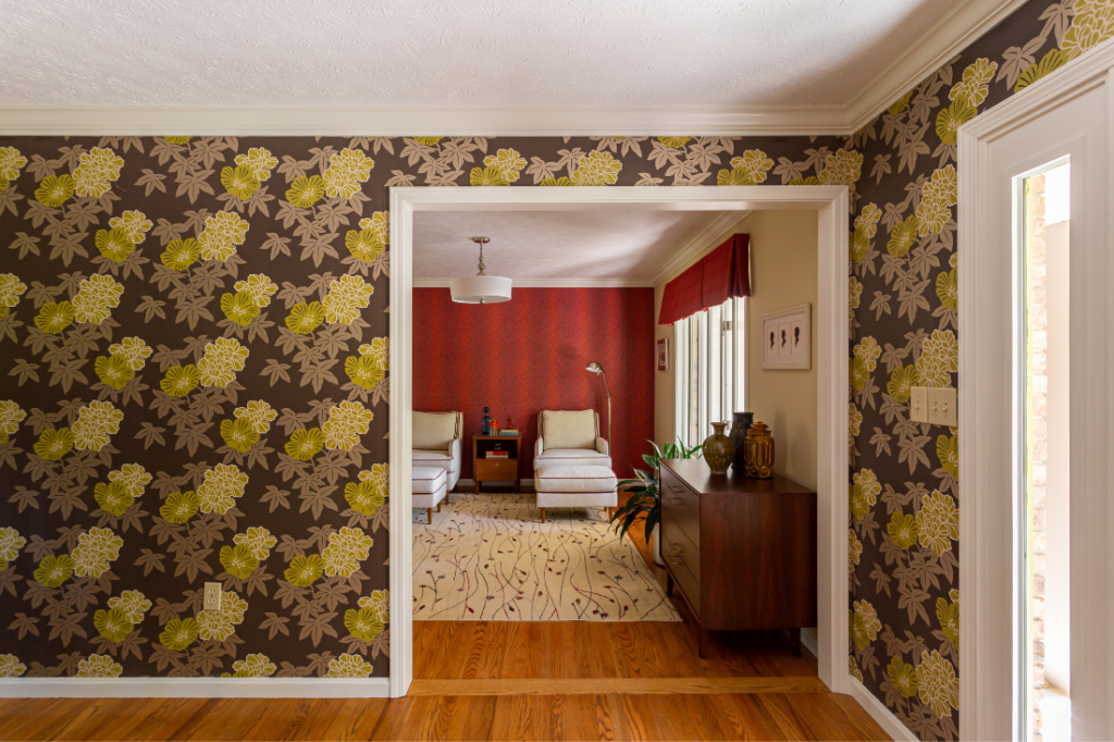 Retro brown and green floral wallpaper in Mid-Century Foyer Lindsey Putzier Design Studio