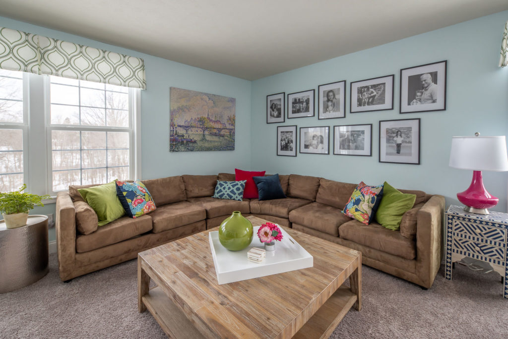 After Image of Loft Area with light blue paint, and brightened pops of color Lindsey Putzier Design Studio