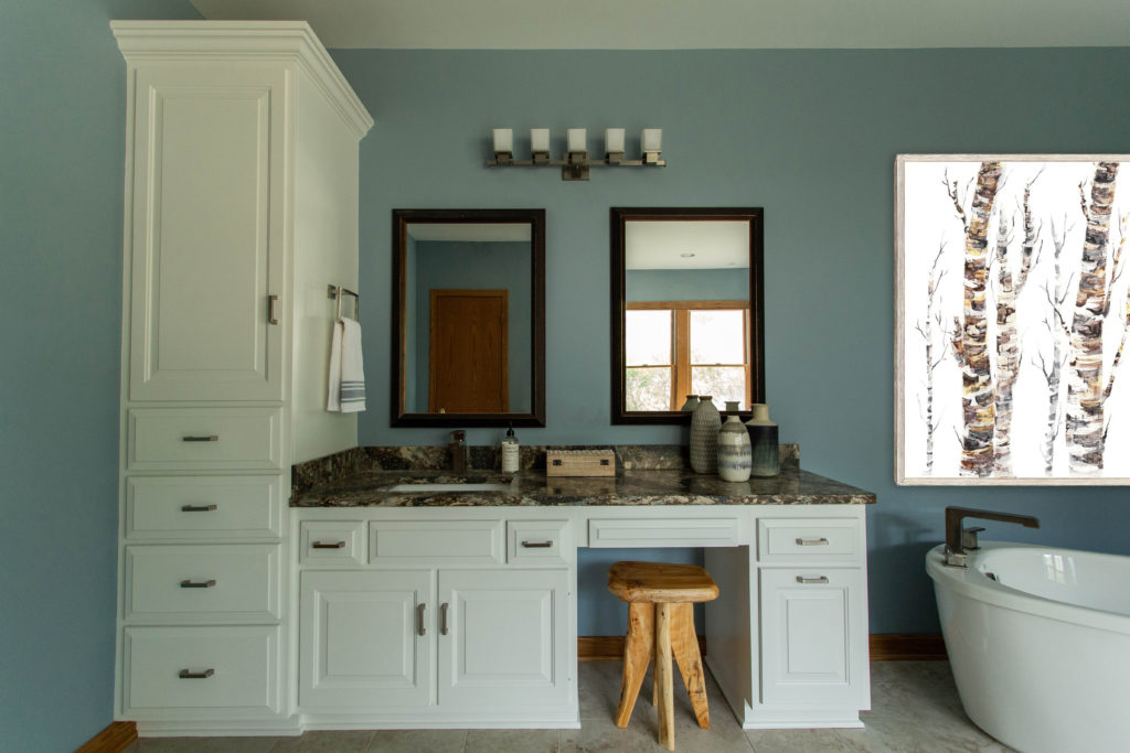 burgundy, black, and tan quartz in Master Bathroom  Lindsey Putzier Design Studio