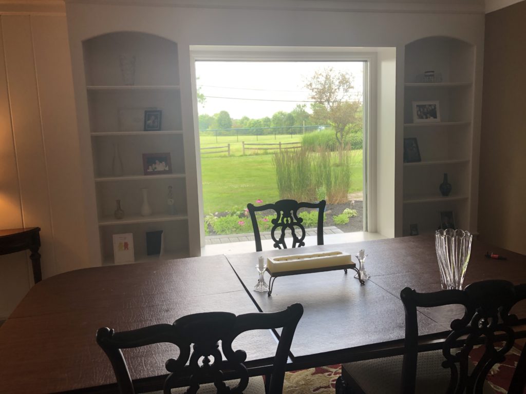 Before Image of white Dining Room built-in shelves Lindsey Putzier Design Studio