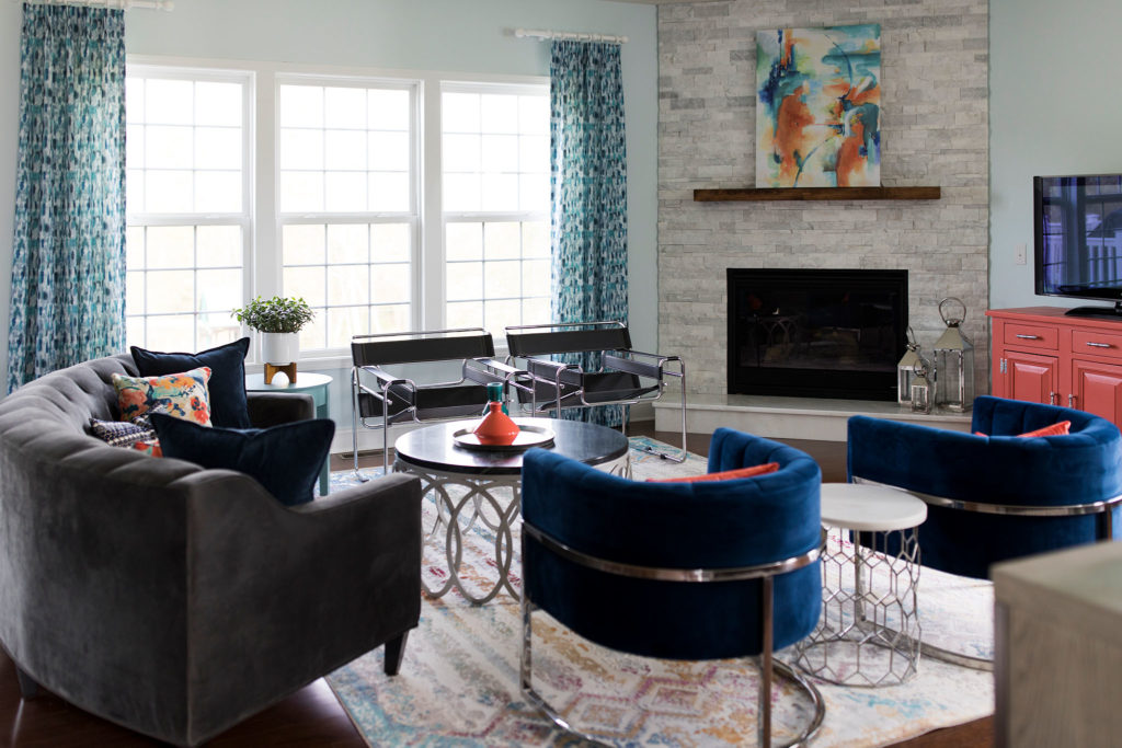 After image of Colorful Contemporary Living Room with larger rug Lindsey Putzier Design Studio