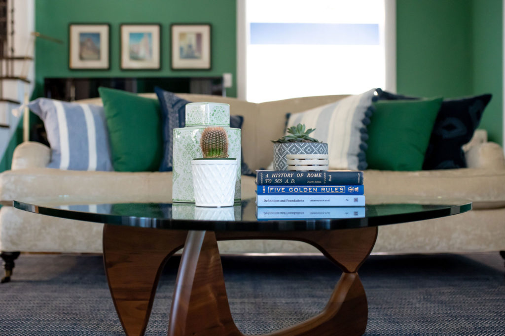 Custom blue and green sofa pillows to Lindsey Putzier Design Studio