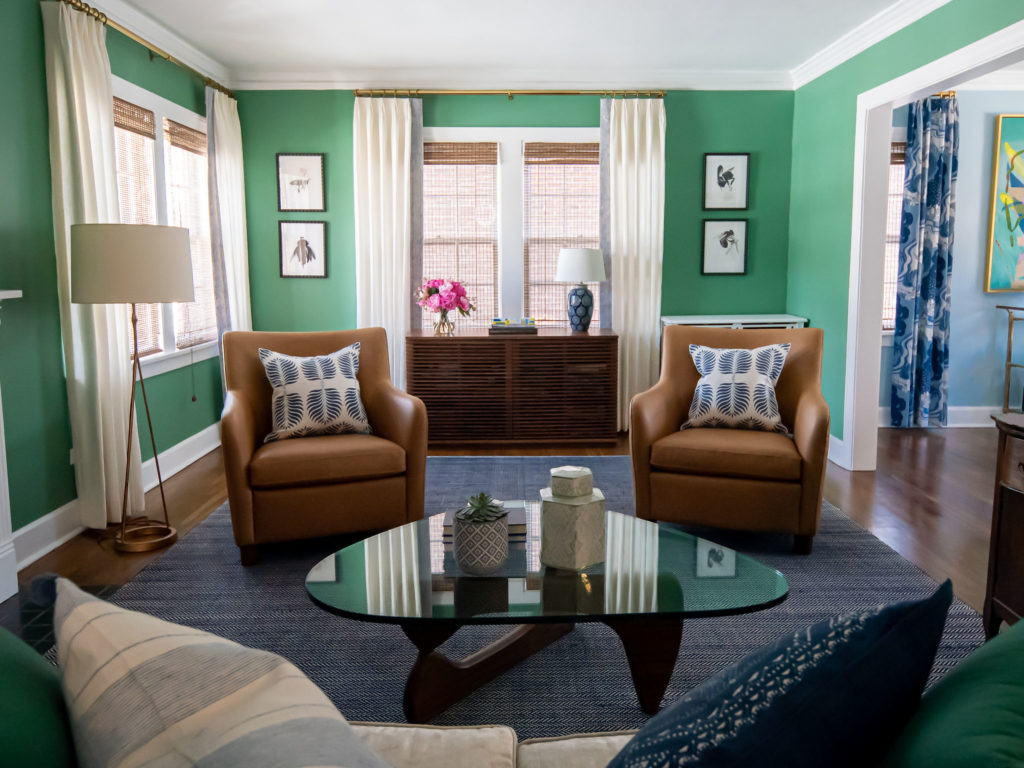 After Image Living Room Makeover with light green walls and neutral custom window treatments Lindsey Putzier Design Studio