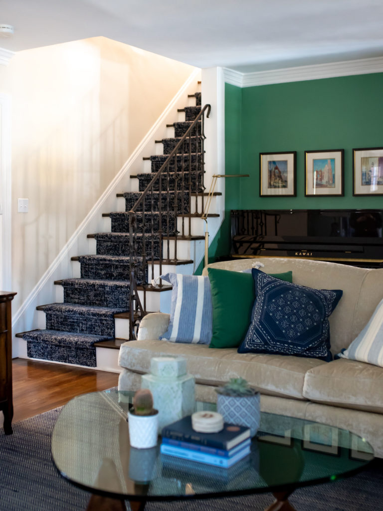 Blue and white stairway runner with dark stained wooden treads Lindsey Putzier Design Studio
